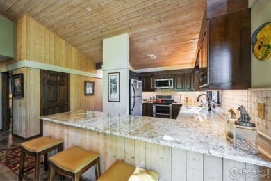 Welcome to a unique blend of tranquil mountain living and on Fox Acres Country Club in Colorado - for sale on GolfHomes.com, golf home, golf lot