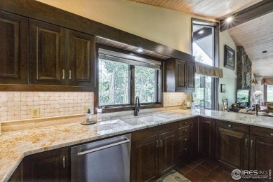 Welcome to a unique blend of tranquil mountain living and on Fox Acres Country Club in Colorado - for sale on GolfHomes.com, golf home, golf lot