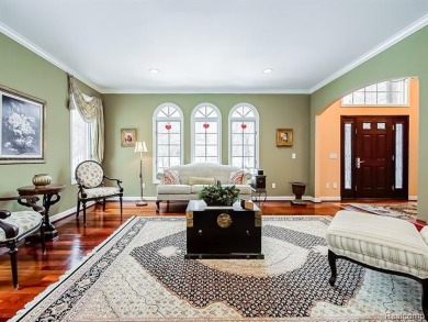 This stunning brick colonial home is nestled on a spacious and on Farmington Hills Golf Club in Michigan - for sale on GolfHomes.com, golf home, golf lot