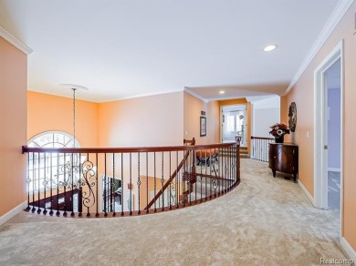 This stunning brick colonial home is nestled on a spacious and on Farmington Hills Golf Club in Michigan - for sale on GolfHomes.com, golf home, golf lot