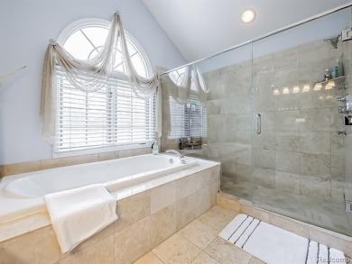 This stunning brick colonial home is nestled on a spacious and on Farmington Hills Golf Club in Michigan - for sale on GolfHomes.com, golf home, golf lot