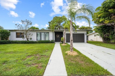 Charming 3 bedroom, 2 bathroom CBS construction home located on Club Med Sandpiper in Florida - for sale on GolfHomes.com, golf home, golf lot