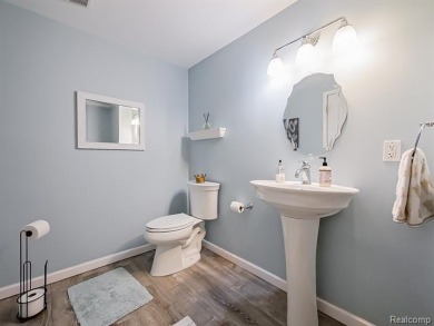 This stunning brick colonial home is nestled on a spacious and on Farmington Hills Golf Club in Michigan - for sale on GolfHomes.com, golf home, golf lot