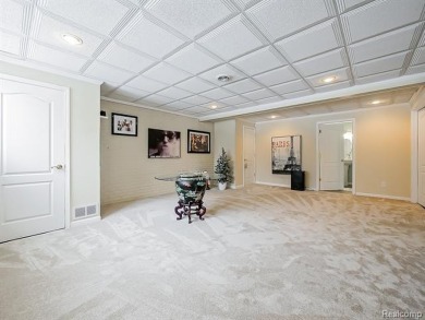 This stunning brick colonial home is nestled on a spacious and on Farmington Hills Golf Club in Michigan - for sale on GolfHomes.com, golf home, golf lot