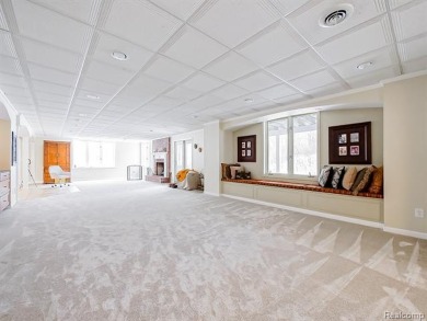This stunning brick colonial home is nestled on a spacious and on Farmington Hills Golf Club in Michigan - for sale on GolfHomes.com, golf home, golf lot