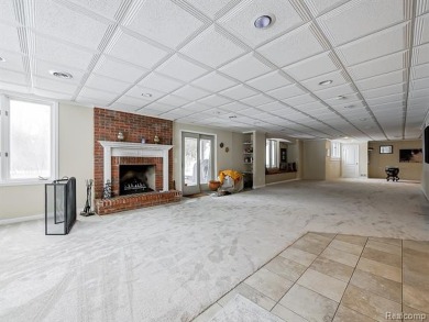 This stunning brick colonial home is nestled on a spacious and on Farmington Hills Golf Club in Michigan - for sale on GolfHomes.com, golf home, golf lot