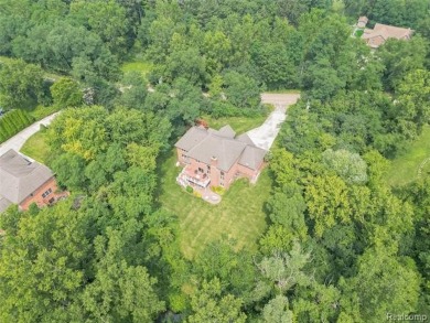This stunning brick colonial home is nestled on a spacious and on Farmington Hills Golf Club in Michigan - for sale on GolfHomes.com, golf home, golf lot
