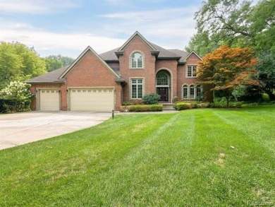 This stunning brick colonial home is nestled on a spacious and on Farmington Hills Golf Club in Michigan - for sale on GolfHomes.com, golf home, golf lot
