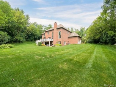 This stunning brick colonial home is nestled on a spacious and on Farmington Hills Golf Club in Michigan - for sale on GolfHomes.com, golf home, golf lot
