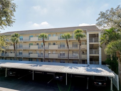 This recently renovated 2nd level end unit residence is light on Plantation Golf and Country Club in Florida - for sale on GolfHomes.com, golf home, golf lot