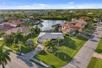 Under contract-accepting backup offers. Welcome to a stunning on Twin Isles Country Club in Florida - for sale on GolfHomes.com, golf home, golf lot