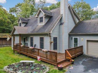 Come enjoy lake life in this elegant Cape cod 3 bedroom 2.5 bath on Paupack Hills Golf and Country Club in Pennsylvania - for sale on GolfHomes.com, golf home, golf lot