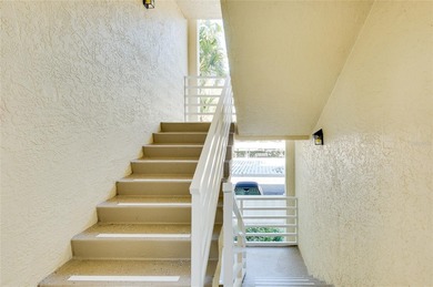 This recently renovated 2nd level end unit residence is light on Plantation Golf and Country Club in Florida - for sale on GolfHomes.com, golf home, golf lot