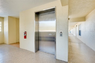 This recently renovated 2nd level end unit residence is light on Plantation Golf and Country Club in Florida - for sale on GolfHomes.com, golf home, golf lot