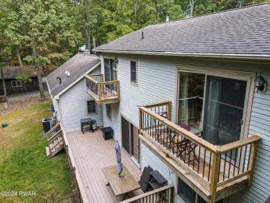 Come enjoy lake life in this elegant Cape cod 3 bedroom 2.5 bath on Paupack Hills Golf and Country Club in Pennsylvania - for sale on GolfHomes.com, golf home, golf lot