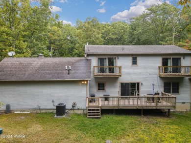 Come enjoy lake life in this elegant Cape cod 3 bedroom 2.5 bath on Paupack Hills Golf and Country Club in Pennsylvania - for sale on GolfHomes.com, golf home, golf lot