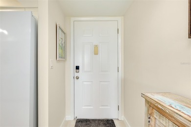 This recently renovated 2nd level end unit residence is light on Plantation Golf and Country Club in Florida - for sale on GolfHomes.com, golf home, golf lot