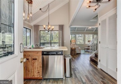 This spectacular villa offers seasonal views of Lake Petit and on Big Canoe Golf Club - Cherokee in Georgia - for sale on GolfHomes.com, golf home, golf lot