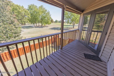 This established townhouse is located just across the street on The Bald Eagle Course At Eagle Creek Golf Club in Missouri - for sale on GolfHomes.com, golf home, golf lot