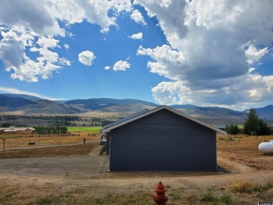 Check out the sweeping views of the golf course and Wind River on Antelope Hills Golf Course in Wyoming - for sale on GolfHomes.com, golf home, golf lot