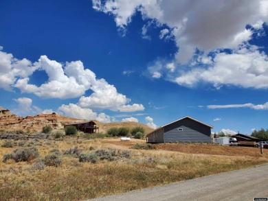 Check out the sweeping views of the golf course and Wind River on Antelope Hills Golf Course in Wyoming - for sale on GolfHomes.com, golf home, golf lot