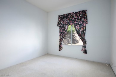 This sought-after Regal model single-family residence offers 3 on Highland Falls Golf Club in Nevada - for sale on GolfHomes.com, golf home, golf lot