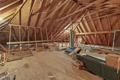 Perfectly positioned across from the golf course in the on Country Club of Jackson in Mississippi - for sale on GolfHomes.com, golf home, golf lot