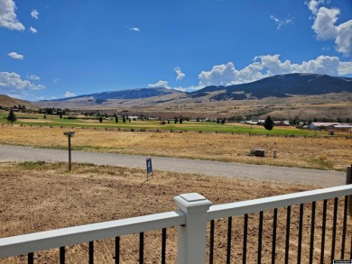 Check out the sweeping views of the golf course and Wind River on Antelope Hills Golf Course in Wyoming - for sale on GolfHomes.com, golf home, golf lot