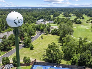 Perfectly positioned across from the golf course in the on Country Club of Jackson in Mississippi - for sale on GolfHomes.com, golf home, golf lot