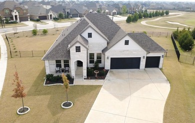 Located in the prestigious Heath Golf & Yacht Club, this on Heath Golf and Yacht Club in Texas - for sale on GolfHomes.com, golf home, golf lot