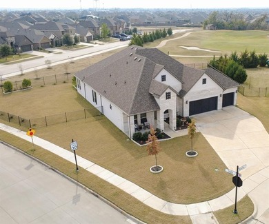 Located in the prestigious Heath Golf & Yacht Club, this on Heath Golf and Yacht Club in Texas - for sale on GolfHomes.com, golf home, golf lot