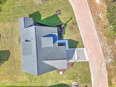 This luxury home at Tidewater at Ocean Isle Beach is now on Brick Landing Plantation Yacht and Golf Club in North Carolina - for sale on GolfHomes.com, golf home, golf lot