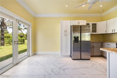 Luxury Waterfront Key West-Style Retreat on nearly 1/2 an acre on Sabal Trace Golf and Country Club in Florida - for sale on GolfHomes.com, golf home, golf lot