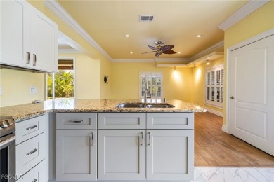 Luxury Waterfront Key West-Style Retreat on nearly 1/2 an acre on Sabal Trace Golf and Country Club in Florida - for sale on GolfHomes.com, golf home, golf lot