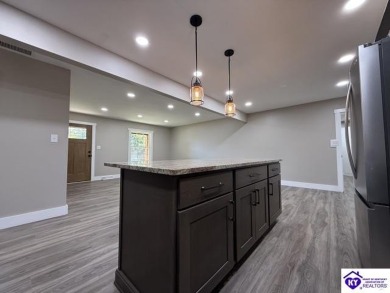 TOTALLY RENOVATED! Experience modern comfort in this beautifully on  in Kentucky - for sale on GolfHomes.com, golf home, golf lot