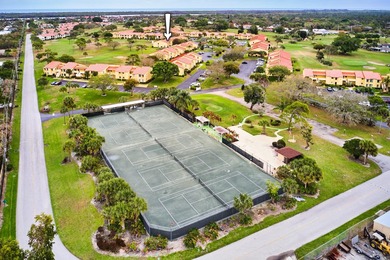 Charming 1BR/1.5BA condo overlooking the golf course in the on Miles Grant Country Club in Florida - for sale on GolfHomes.com, golf home, golf lot