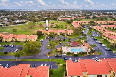Charming 1BR/1.5BA condo overlooking the golf course in the on Miles Grant Country Club in Florida - for sale on GolfHomes.com, golf home, golf lot