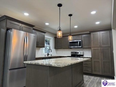TOTALLY RENOVATED! Experience modern comfort in this beautifully on  in Kentucky - for sale on GolfHomes.com, golf home, golf lot