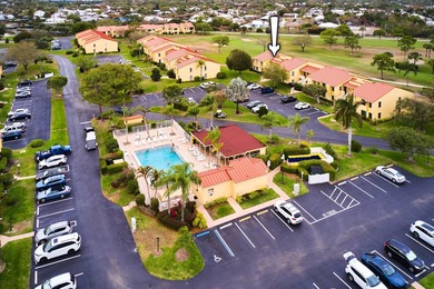 Charming 1BR/1.5BA condo overlooking the golf course in the on Miles Grant Country Club in Florida - for sale on GolfHomes.com, golf home, golf lot