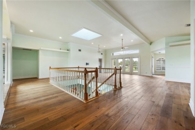 Luxury Waterfront Key West-Style Retreat on nearly 1/2 an acre on Sabal Trace Golf and Country Club in Florida - for sale on GolfHomes.com, golf home, golf lot