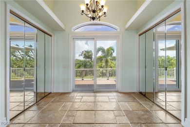 Luxury Waterfront Key West-Style Retreat on nearly 1/2 an acre on Sabal Trace Golf and Country Club in Florida - for sale on GolfHomes.com, golf home, golf lot