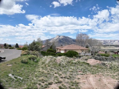 This exceptional .52-acre lot, borders the 17th fairway of on Battlement Mesa Golf Course in Colorado - for sale on GolfHomes.com, golf home, golf lot