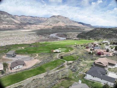 This exceptional .52-acre lot, borders the 17th fairway of on Battlement Mesa Golf Course in Colorado - for sale on GolfHomes.com, golf home, golf lot