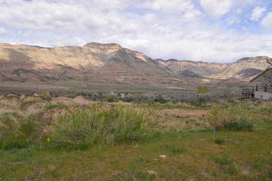 This exceptional .52-acre lot, borders the 17th fairway of on Battlement Mesa Golf Course in Colorado - for sale on GolfHomes.com, golf home, golf lot