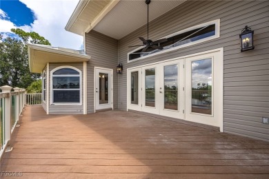 Luxury Waterfront Key West-Style Retreat on nearly 1/2 an acre on Sabal Trace Golf and Country Club in Florida - for sale on GolfHomes.com, golf home, golf lot