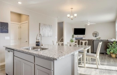 Welcome home to this stunning DR Horton-built home in the heart on Raindance National Golf Course in Colorado - for sale on GolfHomes.com, golf home, golf lot