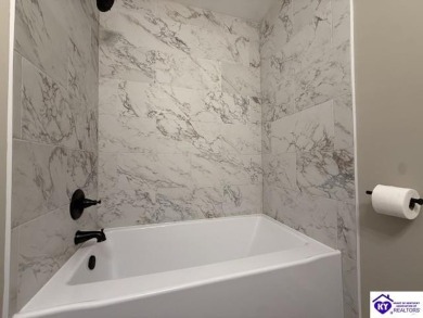 TOTALLY RENOVATED! Experience modern comfort in this beautifully on  in Kentucky - for sale on GolfHomes.com, golf home, golf lot