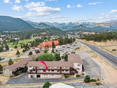 Easy Mountain Living! Kick back and enjoy life in this 2-bedroom on Lake Estes Golf Course in Colorado - for sale on GolfHomes.com, golf home, golf lot