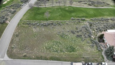 This prime half-acre lot, on top of the 18th tee box of on Battlement Mesa Golf Course in Colorado - for sale on GolfHomes.com, golf home, golf lot