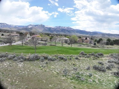 This prime half-acre lot, on top of the 18th tee box of on Battlement Mesa Golf Course in Colorado - for sale on GolfHomes.com, golf home, golf lot